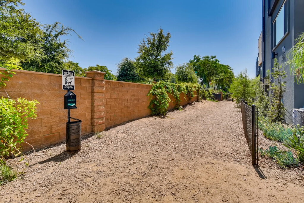 Outdoor dog park with waste station