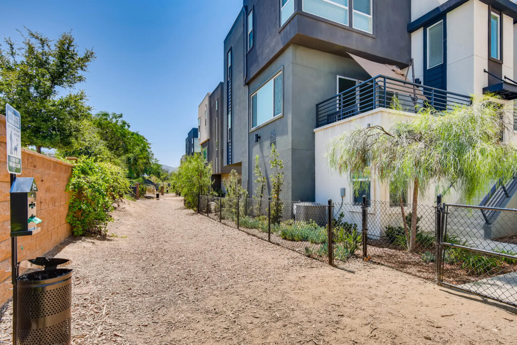 Outdoor dog park with waste station