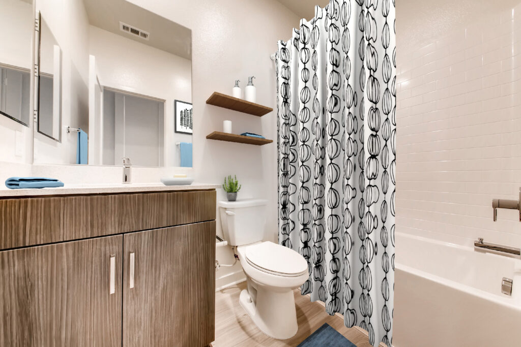 Bathroom with toilet and tub shower